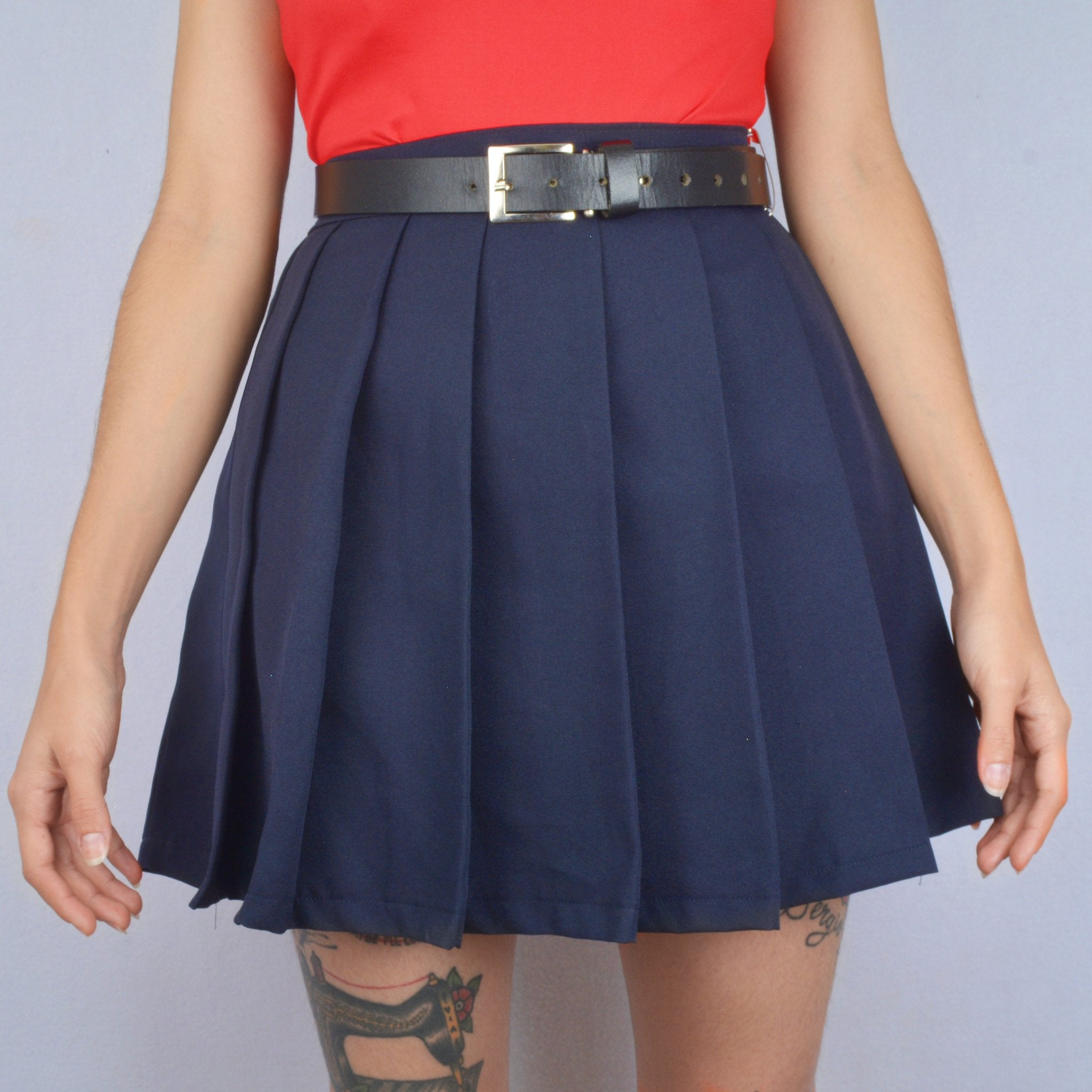 FALDA COLLEGE AZUL OSCURA — PRENSES